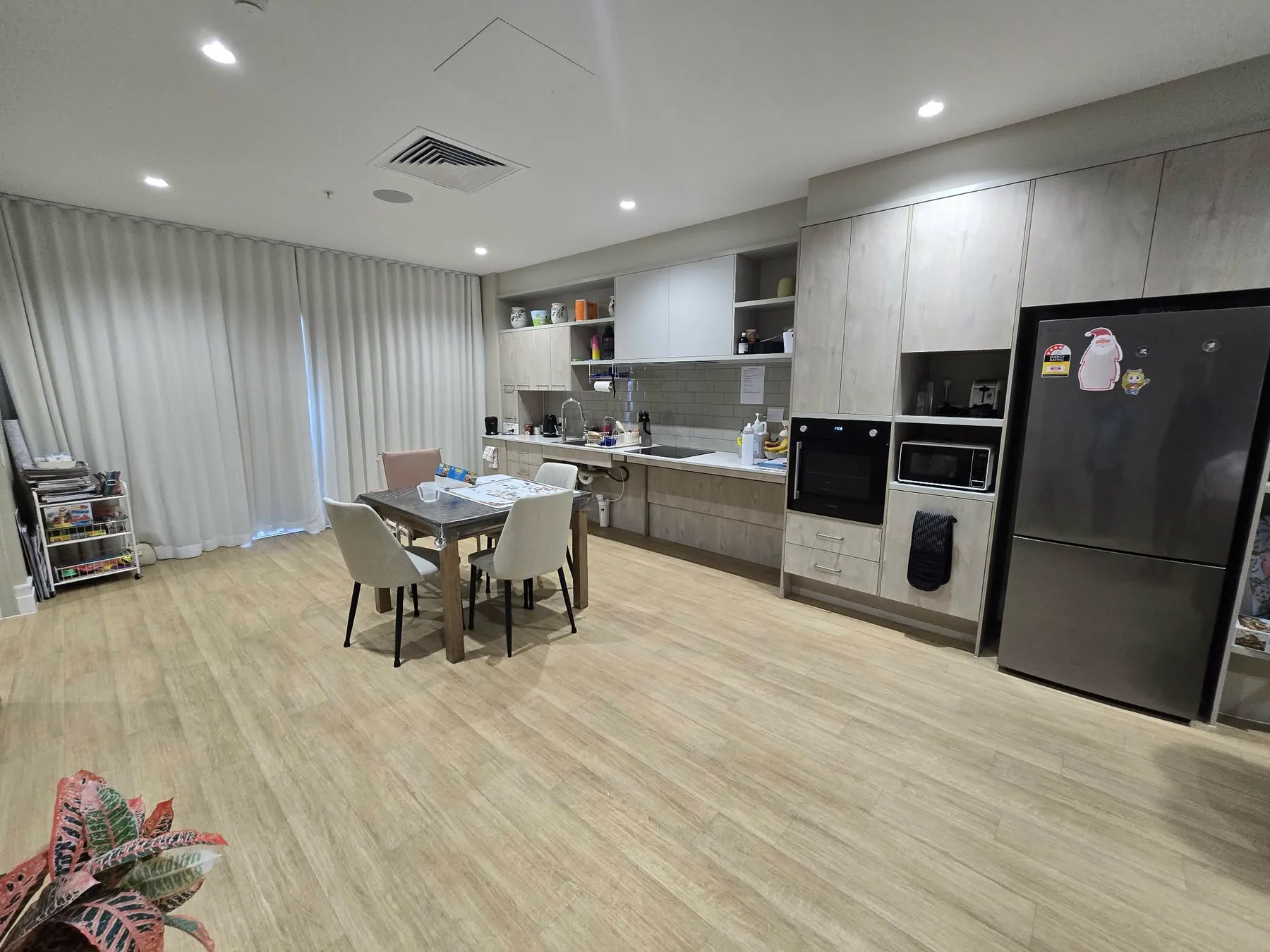 Open-plan accessible kitchen and dining area