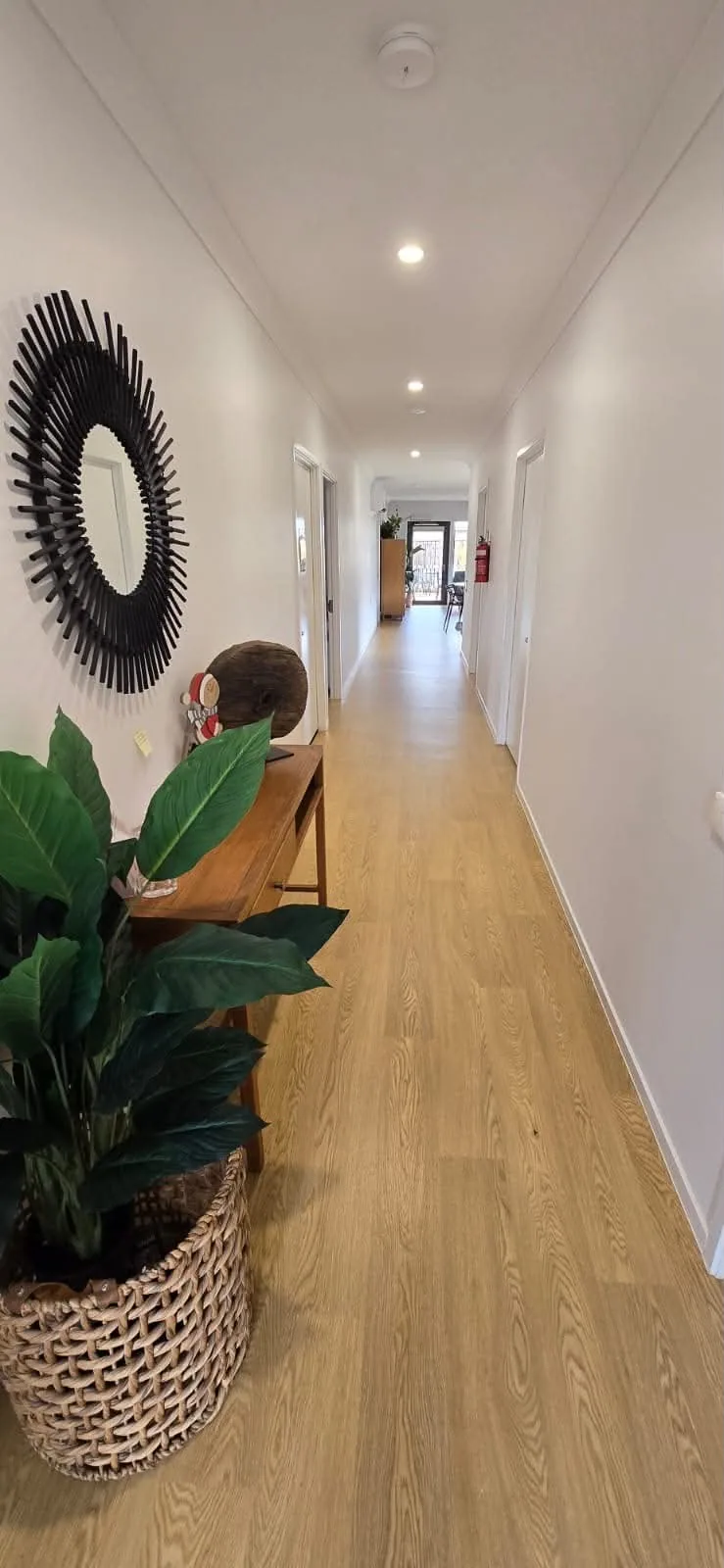 Wide hallway with level flooring